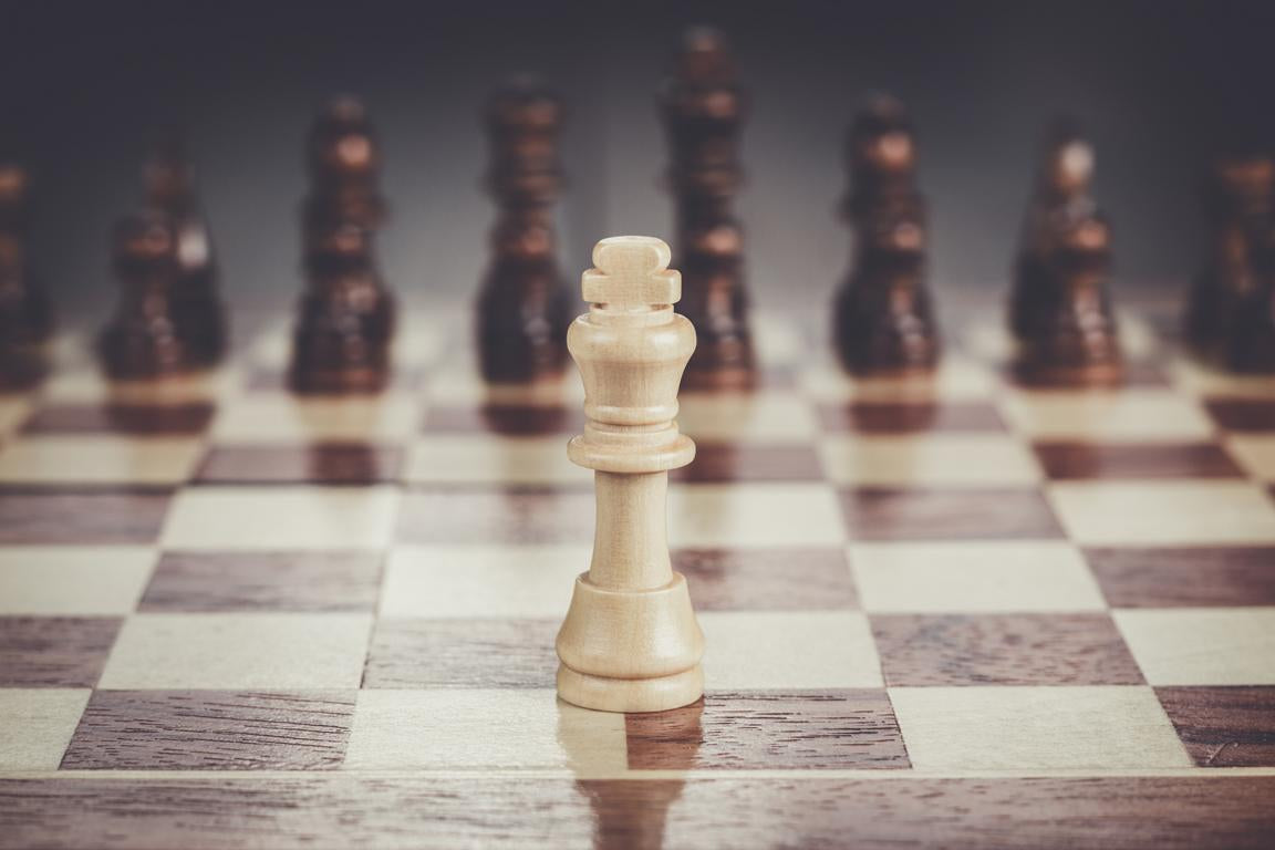 white king on the chess board 